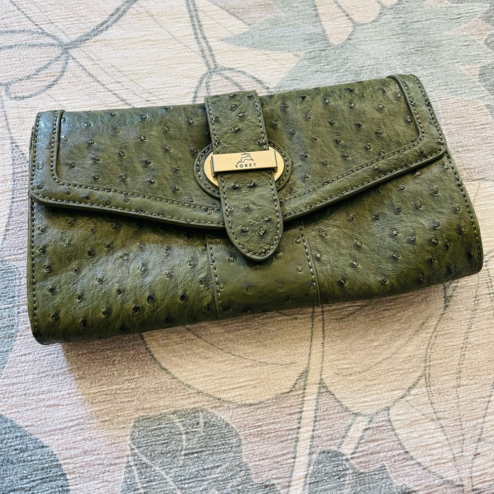 Authentic Koret ostrich clutch with removable strap. Like new condition.